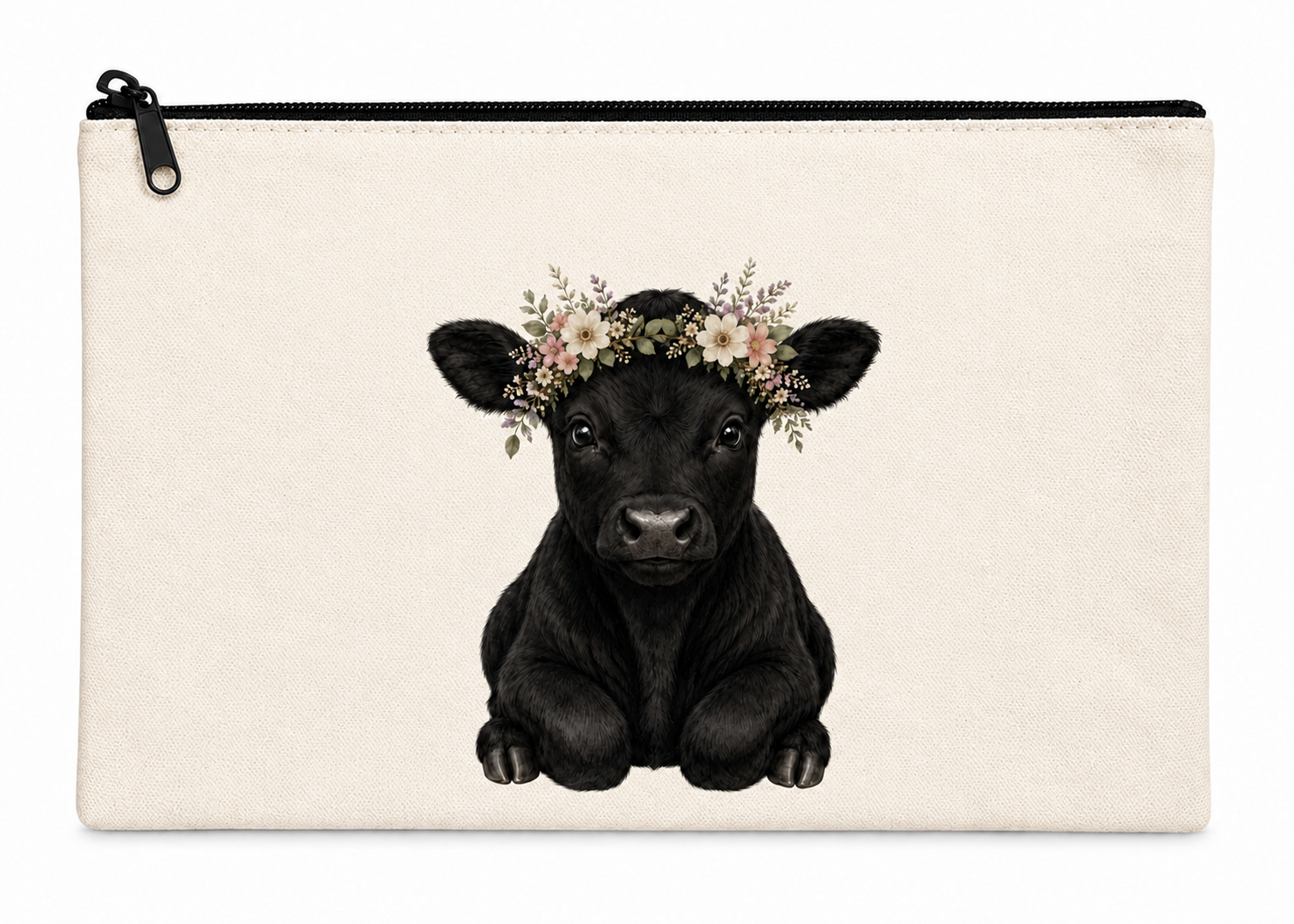Canvas pouch with a black cow illustration wearing a floral crown on a white background